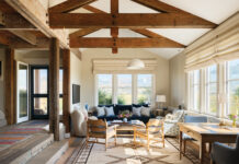 Inside a Crested Butte Home That Skips the Western Clichés Interior living area with high beamed ceilings the Crested Butte home designed by Emily Tucker.