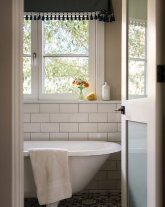 Bathroom with claw foot tub in the Crested Butte home designed by Emily Tucker.