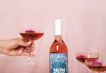 A Wine Brand That Celebrates the Chaos of Motherhood Product shot of Mom Juice in a bottle and glasses.