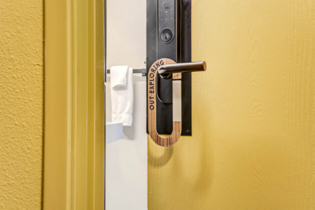 Door hanger at The Outrider Hotel.