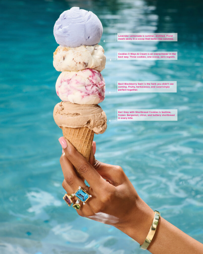 Multiple scoops of ice cream on an ice cream cone by the pool.
