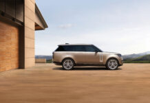 Range Rover Brings Quiet Luxury to Colorado Trails The 2026 Range Rover sits in a driveway in front of the mountains.