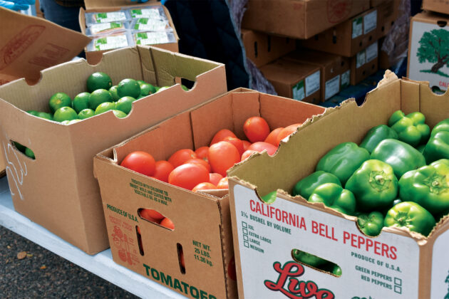 Boxes of produce at We Don't Waste.