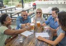 One City. A World of Experiences. People dine in Aurora.