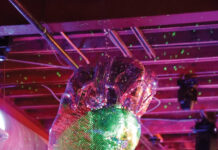 Abstruse Brings Mirrored Magic to a LoDo Bar The giant disco cowboy boot at Belles and Boots, created by Abstruse.