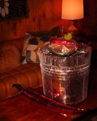 Mirrored disco cocktail and chili pepper by Abstruse.