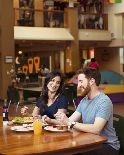 Two people dine together at Mango House.