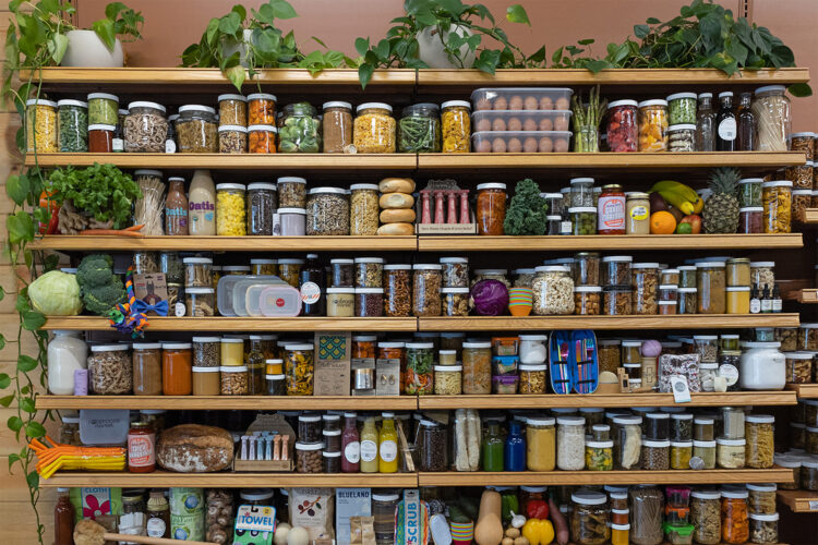 Jarred products line the shelves at Nude Foods Market.