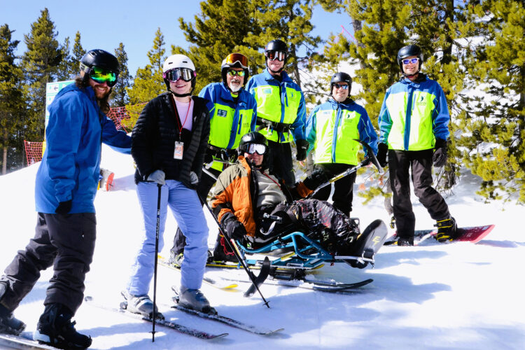 Members of Ignite Adaptive Sports pose for the camera.