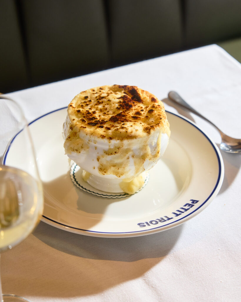 French onion soup topped with browned, melted cheese at Petit Trois Aspen.